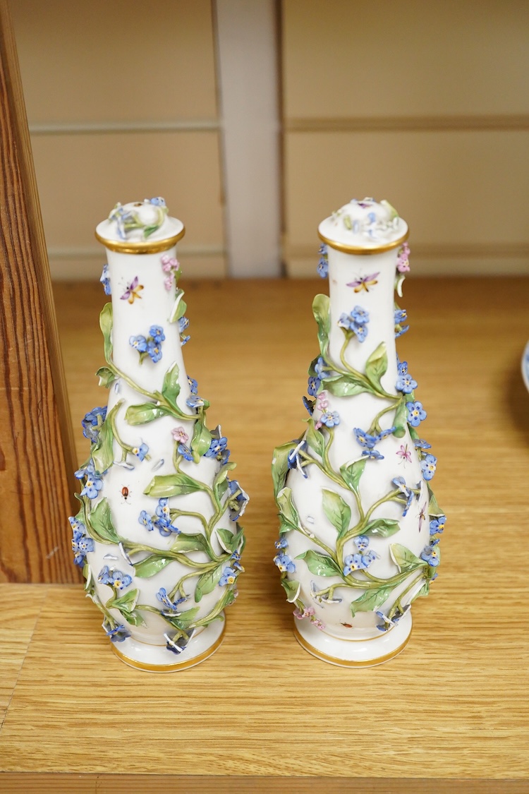 A pair of late 19th century Meissen flower encrusted vases and covers, 20cm high